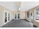 Spacious sun room with tile floor and natural light, perfect for entertaining or relaxing indoors at 1411 Fernwood Pl, Seffner, FL 33584