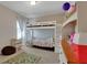 bedroom with a bunk bed, colorful accents, and carpeted floors, perfect for a playful and cozy space at 203 Lovely Ct, Plant City, FL 33566