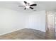 Bedroom featuring a ceiling fan and closet at 4921 Marlin Dr, New Port Richey, FL 34652