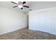 Bedroom with a ceiling fan and closet at 4921 Marlin Dr, New Port Richey, FL 34652