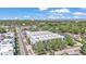 Aerial shot showcasing building, lush trees and cityscape backdrop at 5008 S Macdill Ave # 12, Tampa, FL 33611