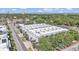 Aerial view of building highlighting roof, surrounding trees and cityscape at 5008 S Macdill Ave # 12, Tampa, FL 33611