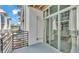A modern balcony with metal railings offers seamless indoor-outdoor living with views of the surrounding community at 5008 S Macdill Ave # 12, Tampa, FL 33611