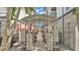 Exterior walkway with metal awning, landscaping, and mailboxes for residents at 5008 S Macdill Ave # 12, Tampa, FL 33611