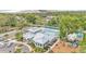 View of the community center and pool with pool-side playground and seating at 9015 Spruce Creek Cir, Riverview, FL 33578