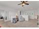 Relaxing loft area with comfortable seating, neutral colors, and natural light at 9015 Spruce Creek Cir, Riverview, FL 33578