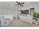 Upstairs loft area with media center, TV, and comfortable seating at 9015 Spruce Creek Cir, Riverview, FL 33578