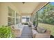 Relaxing screened patio with comfortable seating, perfect for outdoor enjoyment at 9015 Spruce Creek Cir, Riverview, FL 33578
