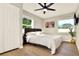 Comfortable bedroom with plenty of natural light and a large closet at 13032 Cumberland Dr, Largo, FL 33773