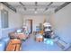 A large and roomy garage with lots of room for storage and a door to an inside room at 13032 Cumberland Dr, Largo, FL 33773