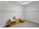 Spacious walk-in closet featuring shelving for organization and carpet flooring at 701 E 60 Hwy, Plant City, FL 33567