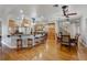 Open kitchen featuring a breakfast bar, a stainless steel fridge, and wooden cabinets at 701 E 60 Hwy, Plant City, FL 33567