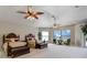 Expansive main bedroom featuring two beds, ample natural light, and space for seating at 701 E 60 Hwy, Plant City, FL 33567