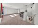 Expansive bonus room featuring neutral carpet and natural light, perfect for entertainment at 1009 Golden Shiner Ave, Ruskin, FL 33570