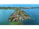 Waterfront property showcasing a residence with its own private dock and stunning water views at 1140 Boca Ciega Isle Dr, St Pete Beach, FL 33706