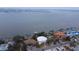Waterfront property featuring panoramic views, with private boat docks and lush landscaping at 1140 Boca Ciega Isle Dr, St Pete Beach, FL 33706