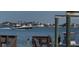 Scenic waterfront view featuring a passing yacht and private dock access at 1140 Boca Ciega Isle Dr, St Pete Beach, FL 33706