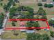Aerial view of property showing the home, outbuildings, and boundary lines at 18818 Dorman Rd, Lithia, FL 33547