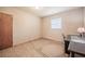 Bedroom with light tile flooring, one window and a desk at 18818 Dorman Rd, Lithia, FL 33547