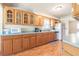 Traditional kitchen with wood cabinets, laminate countertops, and stainless steel appliances at 18818 Dorman Rd, Lithia, FL 33547