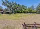 Outbuildings and the expansive lawn show the breadth of the property at 18818 Dorman Rd, Lithia, FL 33547