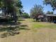 Expansive grassy property featuring large trees and an outbuilding at 18818 Dorman Rd, Lithia, FL 33547