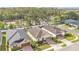 Charming single-Gathering home showcasing a well-manicured lawn, paver driveway, and desirable community setting at 3134 Macintosh Rd, Land O Lakes, FL 34639