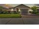 Charming single-story home with a brick driveway and beautifully landscaped front yard at 3134 Macintosh Rd, Land O Lakes, FL 34639