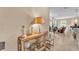 Inviting living room with tile floors, a display cabinet, and furniture at 3134 Macintosh Rd, Land O Lakes, FL 34639