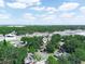 An aerial view of the neighborhood showcasing the property's location and surrounding greenery at 115 W Lee St, Plant City, FL 33563