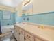 Bathroom with tile countertop sink, bathtub and a tiled shower at 115 W Lee St, Plant City, FL 33563