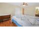 Bedroom featuring a ceiling fan and closet with white doors at 115 W Lee St, Plant City, FL 33563