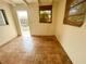 Small bedroom with tile flooring and bright light at 2415 Goldenrod St, Sarasota, FL 34239