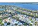 Waterfront neighborhood with canals and homes with solar panels, lush landscaping and boat docks at 4116 4Th Ne Ave, Bradenton, FL 34208