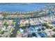 Waterfront neighborhood with canals and homes featuring lush landscaping and private boat docks at 4116 4Th Ne Ave, Bradenton, FL 34208