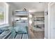 Bright bedroom with multiple bunk beds, offering ample sleeping space and storage, great for or guests at 4116 4Th Ne Ave, Bradenton, FL 34208
