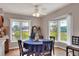 Cozy dining area features a bay window with lush outdoor views at 4116 4Th Ne Ave, Bradenton, FL 34208