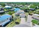 Charming home on the water featuring solar panels, a two-car garage and lush landscaping at 4116 4Th Ne Ave, Bradenton, FL 34208