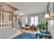 The foyer features wood flooring, an open staircase and plenty of natural light at 4116 4Th Ne Ave, Bradenton, FL 34208