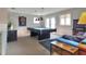 Spacious game room with a sleek pool table, recessed lighting, and comfortable seating, ideal for entertaining guests at 4116 4Th Ne Ave, Bradenton, FL 34208