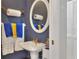 Powder room featuring sink and decor at 4116 4Th Ne Ave, Bradenton, FL 34208
