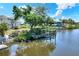 Waterfront property showing canal and dock with boatlift at 4116 4Th Ne Ave, Bradenton, FL 34208