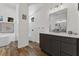 Bright bathroom featuring a free-standing tub, shower and spacious vanity at 6007 Hammock Hill Ave, Lithia, FL 33547