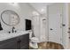 The bathroom features stylish fixtures and a shower behind a glass enclosure at 6007 Hammock Hill Ave, Lithia, FL 33547