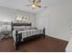A bedroom with a window providing natural light and a ceiling fan for climate control at 6007 Hammock Hill Ave, Lithia, FL 33547