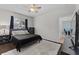 Bedroom with a full-sized bed, tv, and a neutral color scheme at 6007 Hammock Hill Ave, Lithia, FL 33547