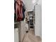 Walk-in closet with custom shelves and drawers provide ample storage and organization at 6007 Hammock Hill Ave, Lithia, FL 33547