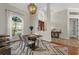 Stylish dining room with a chandelier and a view of the front entrance at 6007 Hammock Hill Ave, Lithia, FL 33547