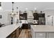 Bright, modern kitchen with stainless steel appliances, double islands and pendant lighting at 6007 Hammock Hill Ave, Lithia, FL 33547