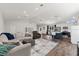 Open concept living room with kitchen and a cozy seating area, perfect for entertaining at 6007 Hammock Hill Ave, Lithia, FL 33547